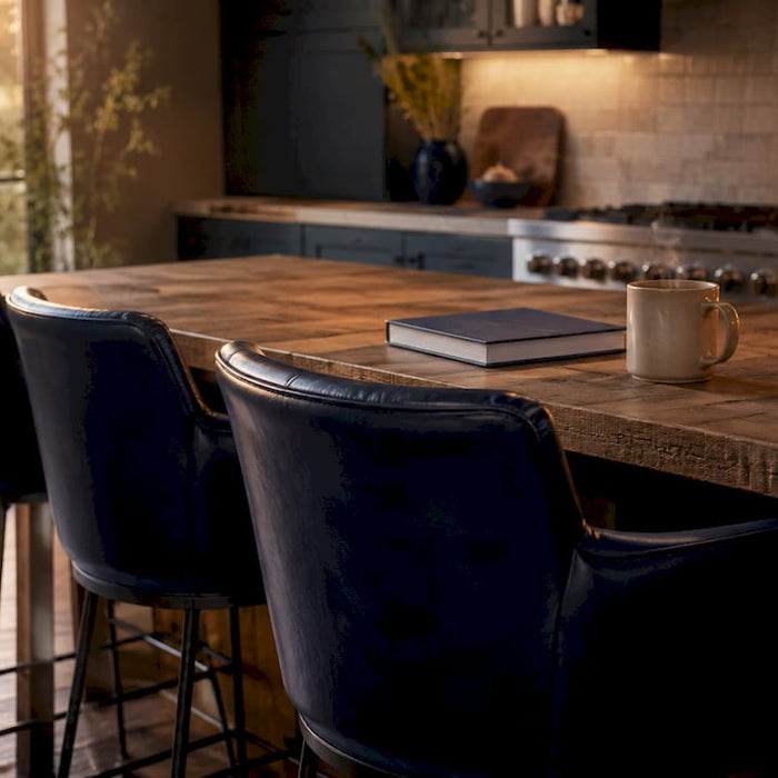 Leather bar stools around kitchen island in natural light